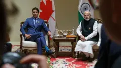জি ২০ শীর্ষ সম্মেলনে কানাডার প্রধানমন্ত্রী জাস্টিন ট্রুডোর সঙ্গে ভারতের প্রধানমন্ত্রী নরেন্দ্র মোদী