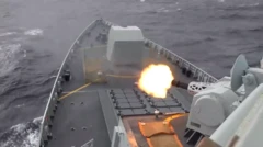 Вигляд із носової частини військового корабля під час стрільби в бік моря