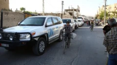 Motar Majalisar Dinkin Duniya da yara a keke