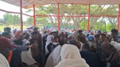 ለቅሶ ላይ ያሉ ሰዎች