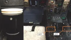 A cup holder (left) and audio control panels (APC) 1 and 2