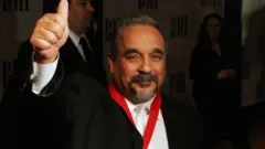 Colón saludando