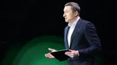  Олексій Чернишов (на той момент Міністр розвитку громад та територій) під час виступу на презентації нових цифрових послуг "Diia Summit", у Києві, 8 лютого 2022 року