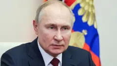 Путин