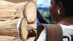 Aworan ilu gangan ati obinrin kan to gbe ilu gangan kọ apa.