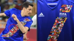 السعودي نواف التمياط مرتديا قميص المباراة ويبدو كما لو أنه قام بـ"طمس" علم إسرائيل