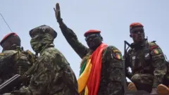 Guinea coup leader with soldiers