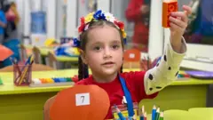 Nika Bondarenko in her kindergarten class