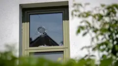 Broken window at Starnberg police station