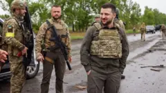 President Zelensky visiting defenders in Kharkiv region