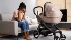 Foto of woman wit baby for carrier