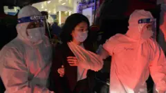 Injured passenger being escorted away by healthcare workers
