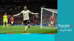 محمد صلاح يحتفل بعد تسجيل هدف في شباك مانشستر يونايتد