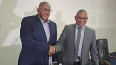 ኣቶ ጌታቸው ረዳን ዶ/ር ደብረ ጽኦን ገብረ ሚካኤልን