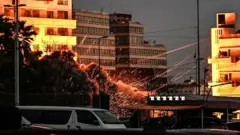 A fireball rises from the site of an Israeli airstrike that targeted a building in Beirut's Bashoura neighbourhood early on March 18, 2026. Lebanon was drawn into the Middle East war on March 2 when Iran-backed militant group Hezbollah launched rockets towards Israel in response to US-Israeli strikes that killed Iranian supreme leader Ayatollah Ali Khamenei.