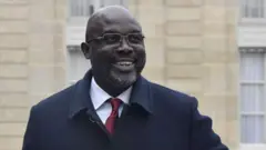 ፕረዚደንት ጆርጅ ዊሃ 