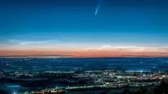 Noctilucent clouds float in the night sky as the Neowise comet streaks past in Wellington, Telford. Photo by Weather Watcher Bigolives.