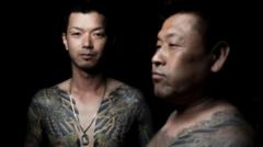 Foto yakuza yang identik memiliki tato.