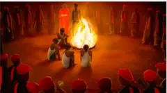 Aworan awọn ẹlẹgbẹ okunkun pẹlu ina ti wọn da silẹ