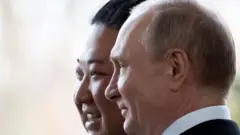 ኪም ጆን ኡን እና ቭላድሚር ፑቲን