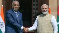 मालदीव के राष्ट्रपति मुइज़्ज़ू और भारत के प्रधानमंत्री नरेंद्र मोदी