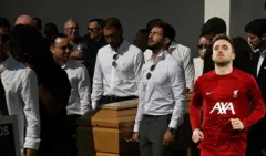 Former teammates carry the coffin during the funerals of Liverpool's Portuguese forward Diogo Jota and his brother Andre Silva at the Mother Church of Gondomar, on the outskirts of Porto, on July 5, 2025
