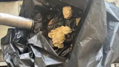 otpad iz vc šolje iz aviona Er Indije