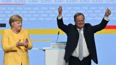 CDU-Chef Armin Laschet (rechts) und Angela Merkel.