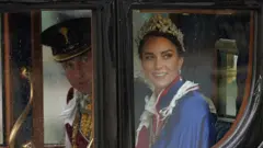 The Prince and Princess of Wales return to Buckingham Palace by coach