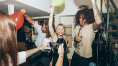 young people partying in a house