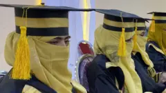 Female students of a private university attend their graduation ceremony, with the attendance of Taliban authorities, in Kandahar, Afghanistan on November 27, 2021.