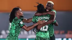 Victor Osimhen, Alex Iwobi and Ademola Lookman dey celebrate goal for Nigeria