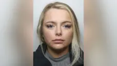 Katie Evans mugshot from police.