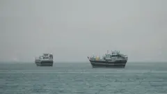 سفينتان بمضيق هرمز.