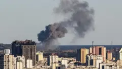 Smoke rises on the outskirts of Ukraine's capital Kyiv after Russian missile attack. Photo: 31 October 2022