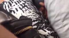 Di video clip as man dey chook hand for her pant