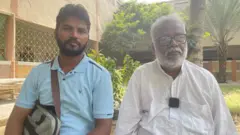  محمد حسنین اپنے بیٹے اسحاق امیر کے ساتھ