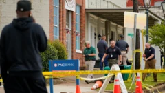 Law enforcement officers at the scene of the shooting in Dadeville, Alabama