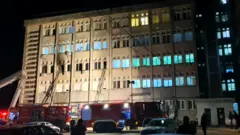 The emergency services at the scene of a hospital fire where the intensive care unit was burned in Piatra Neamt, Romania, 14 November 2020