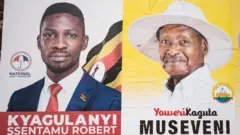 Posters of Bobi Wine and Yoweri Museveni