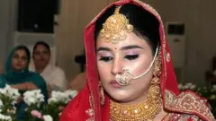 ભગવંત માન અને તેમનાં પત્ની ગુરપ્રીતકોર