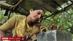 મહિલા