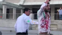 Elmin Bədəlov və mühafizəçi