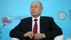 Путин