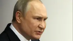 Путин