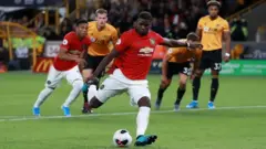 Pogba yahushije penalty ku munota wa 68 igihe Man U yahura na Wolves