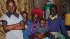 Celestine Adhiambo with her kids