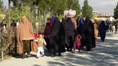 د داعشیانو مېرمنې او ماشومان