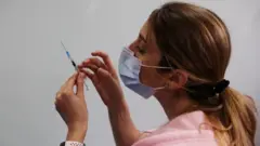вакцина