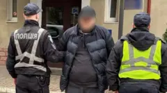 Обвинувачений під час затримання